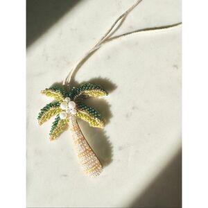 Beaded palm tree with faux pearl bag charm